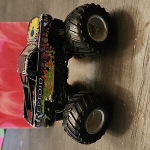 Hotwheels Reptoid 4x4 truck has paint chips flaws metal body